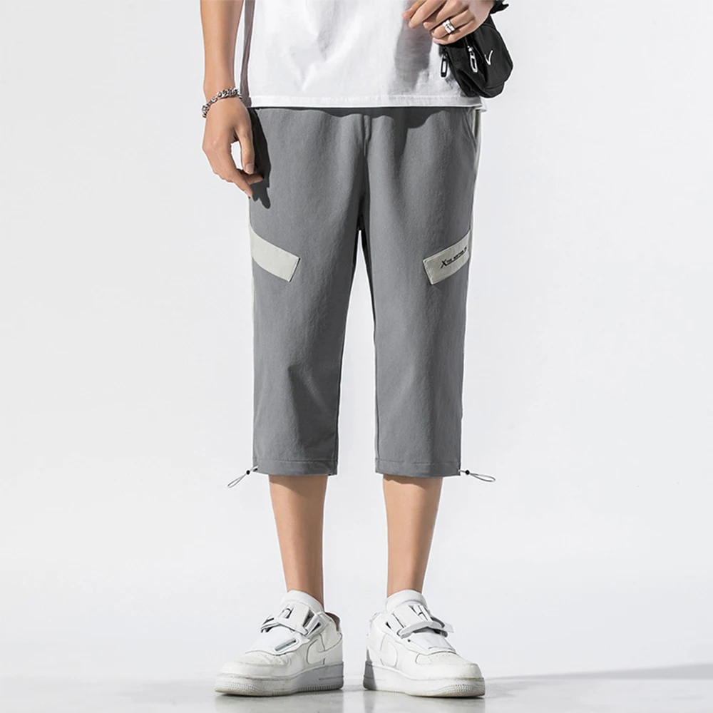 

Men's sports shorts leggings polyester casual pants men's drawstring loose fashion beach pants solid color summer 4xl