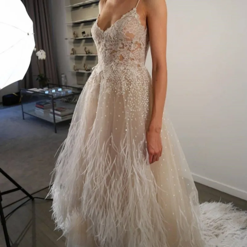 

2020 Prom Dresses Sexy Spaghetti Champagne Lace Appliques Beaded Luxury Feather Court Train Evening Gowns Vestidos De Fiesta