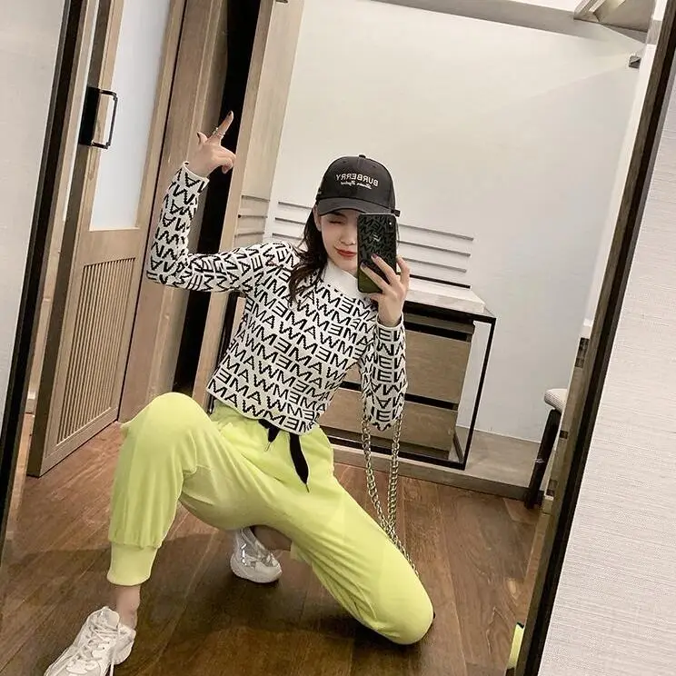 

Korean fashion letter knitting half high neck sweater women's short autumn 2020 new long sleeve navel exposed sweater