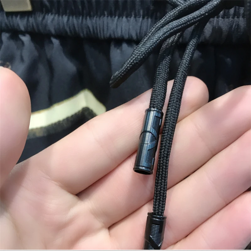 

2021 high-quality handsome men's designer brand beach printed shorts stretch sports comfortable casual pants