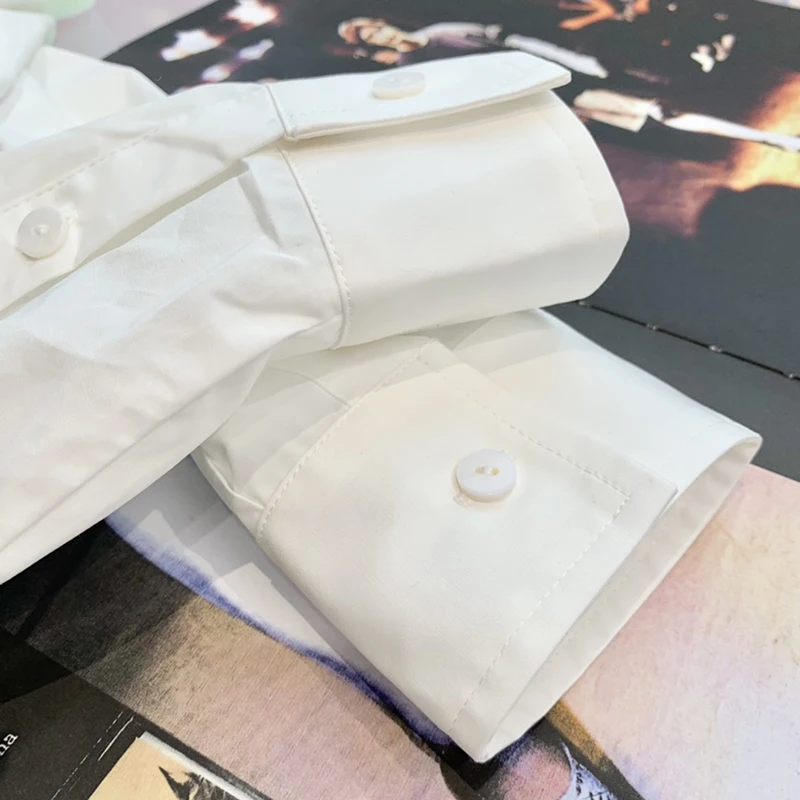 

VGH White Casual Shirts For Women Lapel Long Sleeve Patchwork Pockets Minimalist Straight Women's Blouses 2021 Fashion Style New