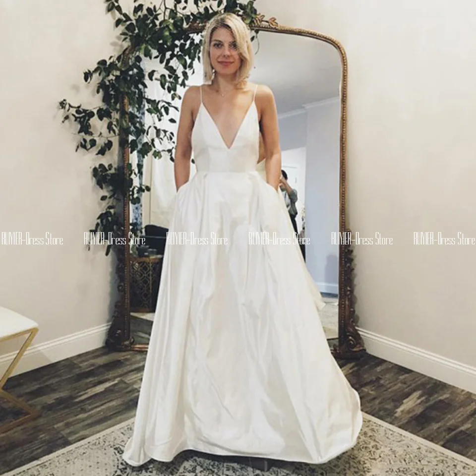 

Simple V Neck Wedding Dresses With Pockets Spaghetti Straps A Line Bridal Gowns Zipper Up Back Floor Length Vestidos De Novia
