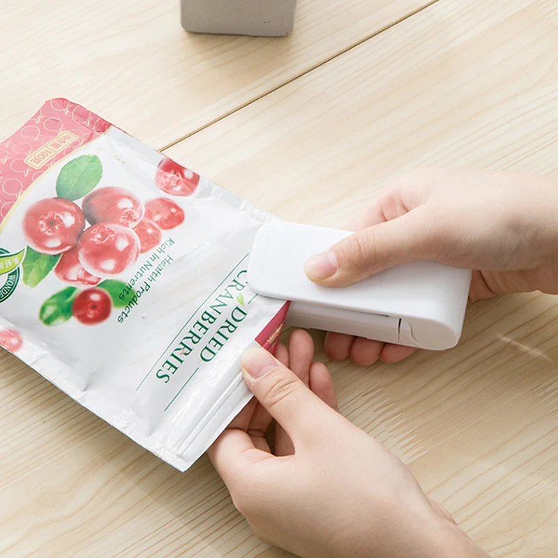 

Миниатюрный упаковщик пакетов, портативная быстрая ручная термоусадочная машина для еды, кухни