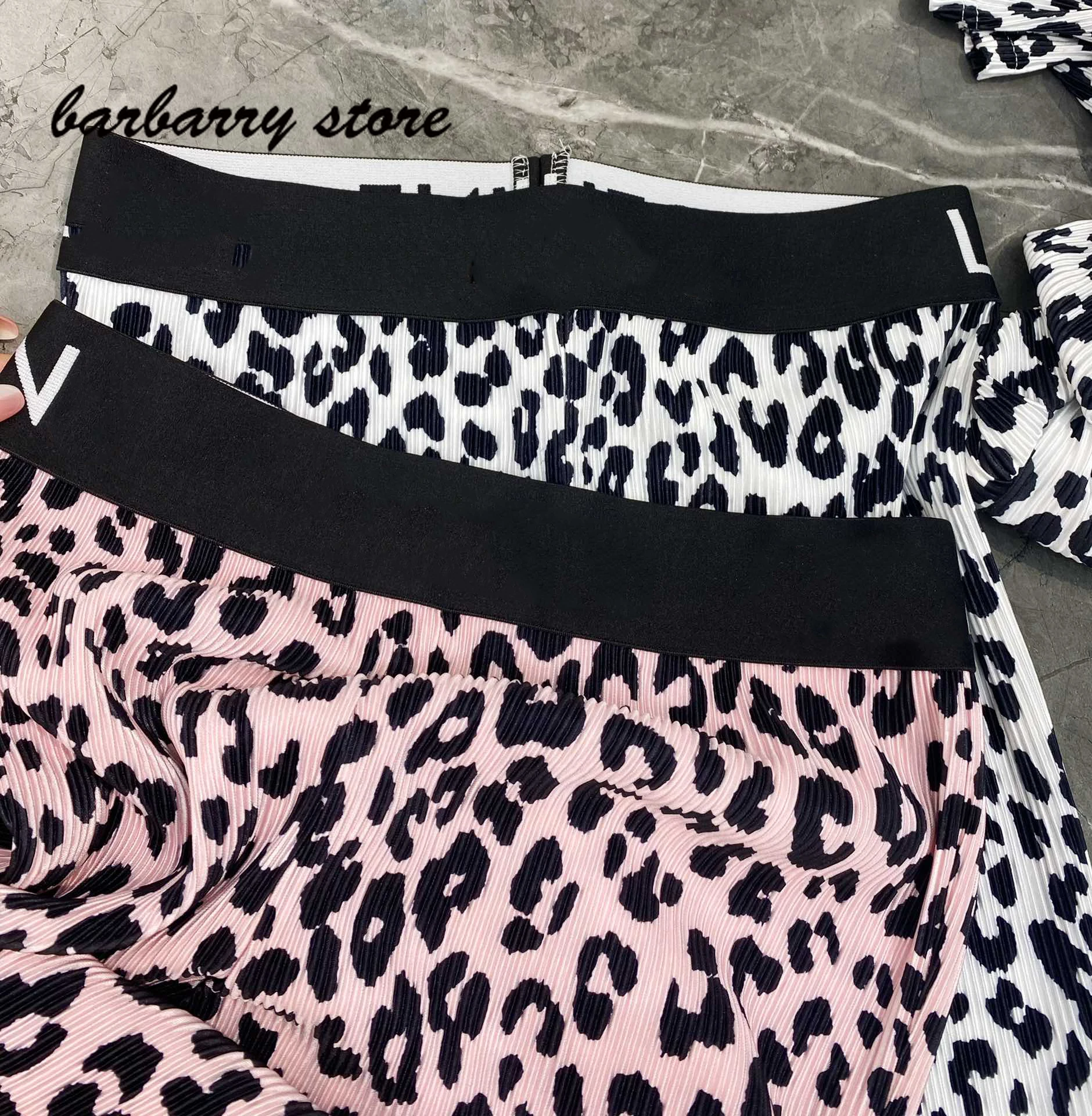 

2021 luxury brand leopard print fashion women's suit temperament shoulder pad half sleeve top + high waist slim leg split pants