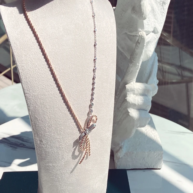

Women's two-tone twisted chain bow necklace S925 Sterling silver Jewelry Original White gold inlaid zircon asymmetric design