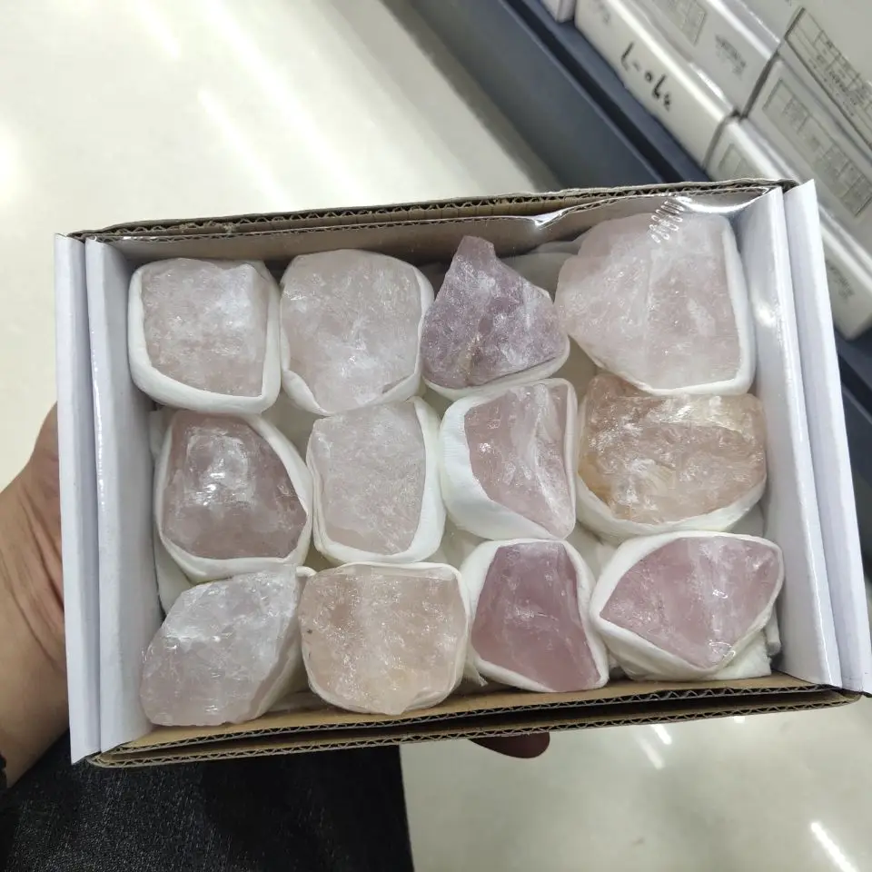 

a box of Natural crystal mineral pink crystal raw stone healing crystal.
