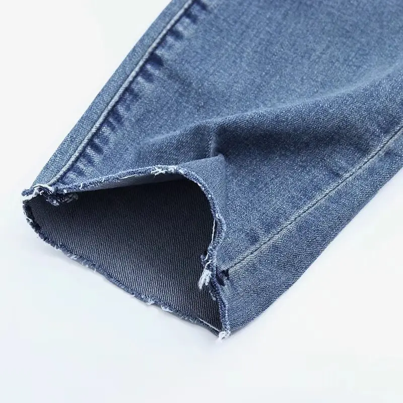 

Europe Women High Waist Washed Jeans Ripped Bleached Denim Pants Ankle-Length Pencil Pants Vintage All Match Streetwear Spring