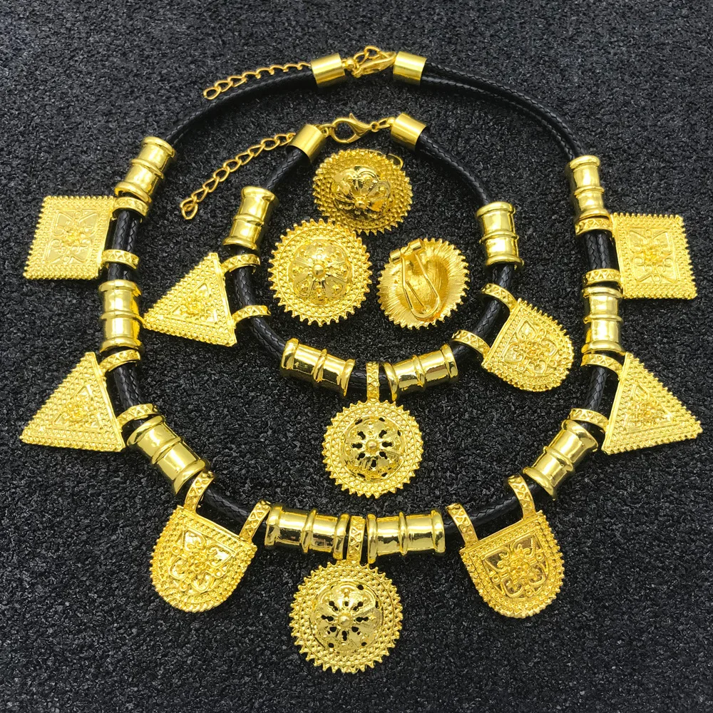 

QWC Four-Piece Gold-Plated Jewelry Set for Women Necklace Bracelet Earrings Ring Set Fashion Ethnic Style Wedding Jewelry