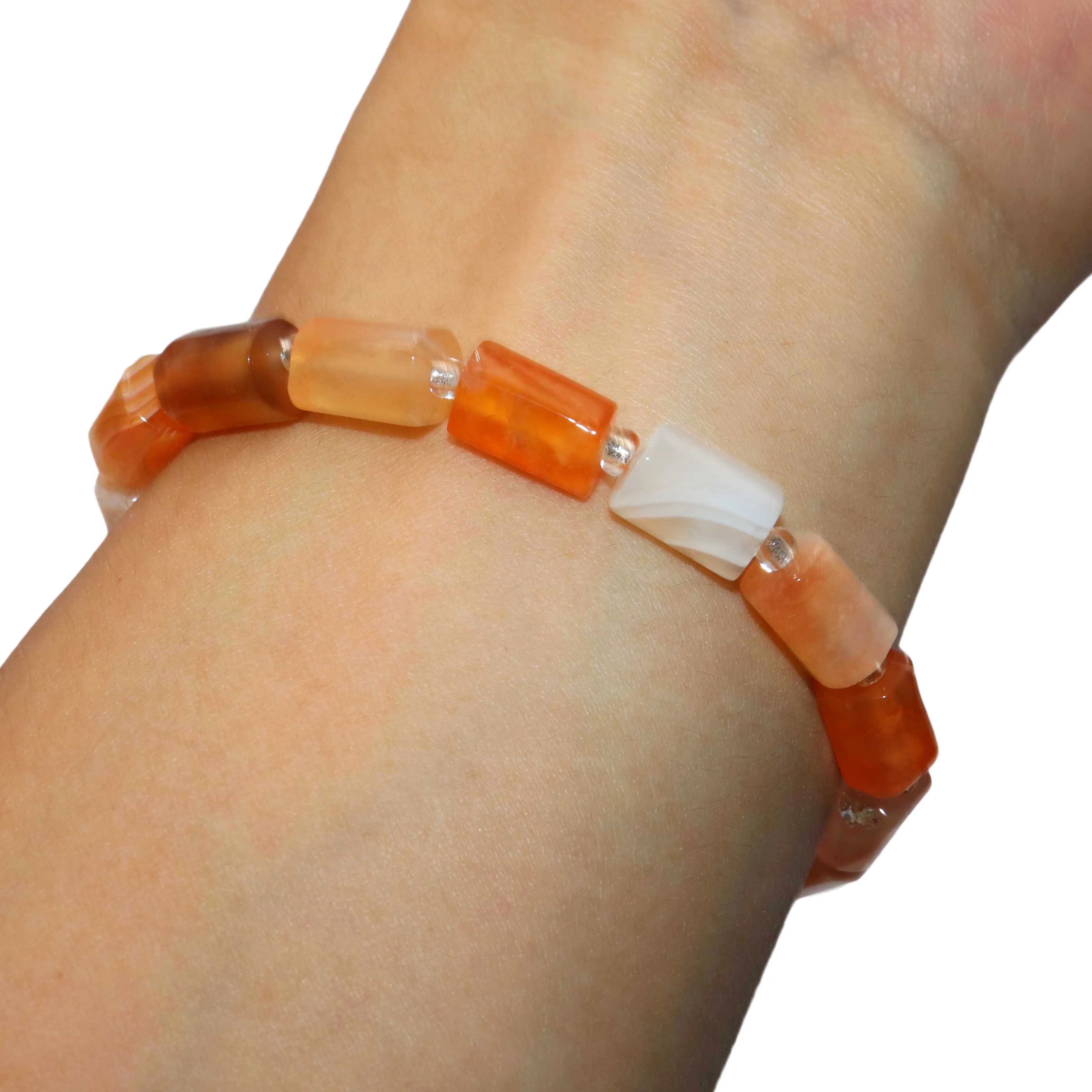 Граненые бусины из натурального камня оранжевого цвета в полоску полые