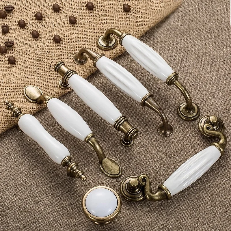 

Antique Bronze White Ceramic Cabinet Handles Zinc Alloy Desk Drawer Knobs Wardrobe Door Handle European Furniture Hardware