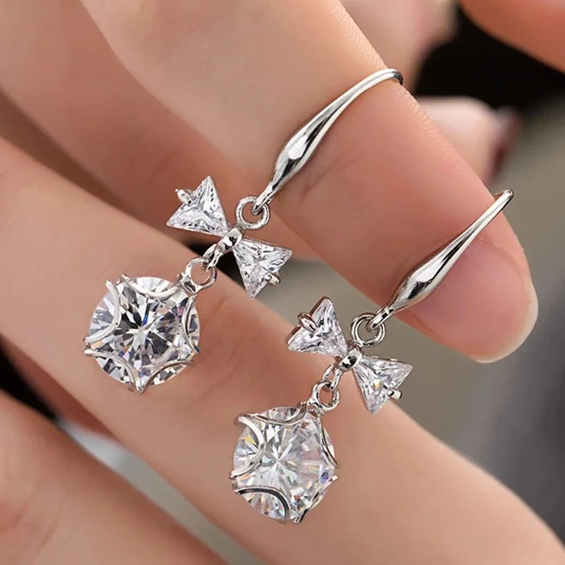 

Megin D Romantic Exquisite Bowknot Tassel Zircon Copper Earrings for Women Lover Mother Friend Fashion Design Gift Jewelry