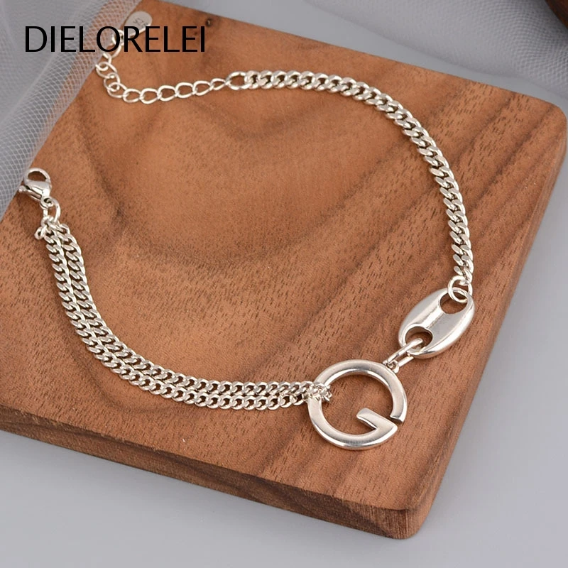 

Женский браслет из серебра 925 пробы, с буквой G