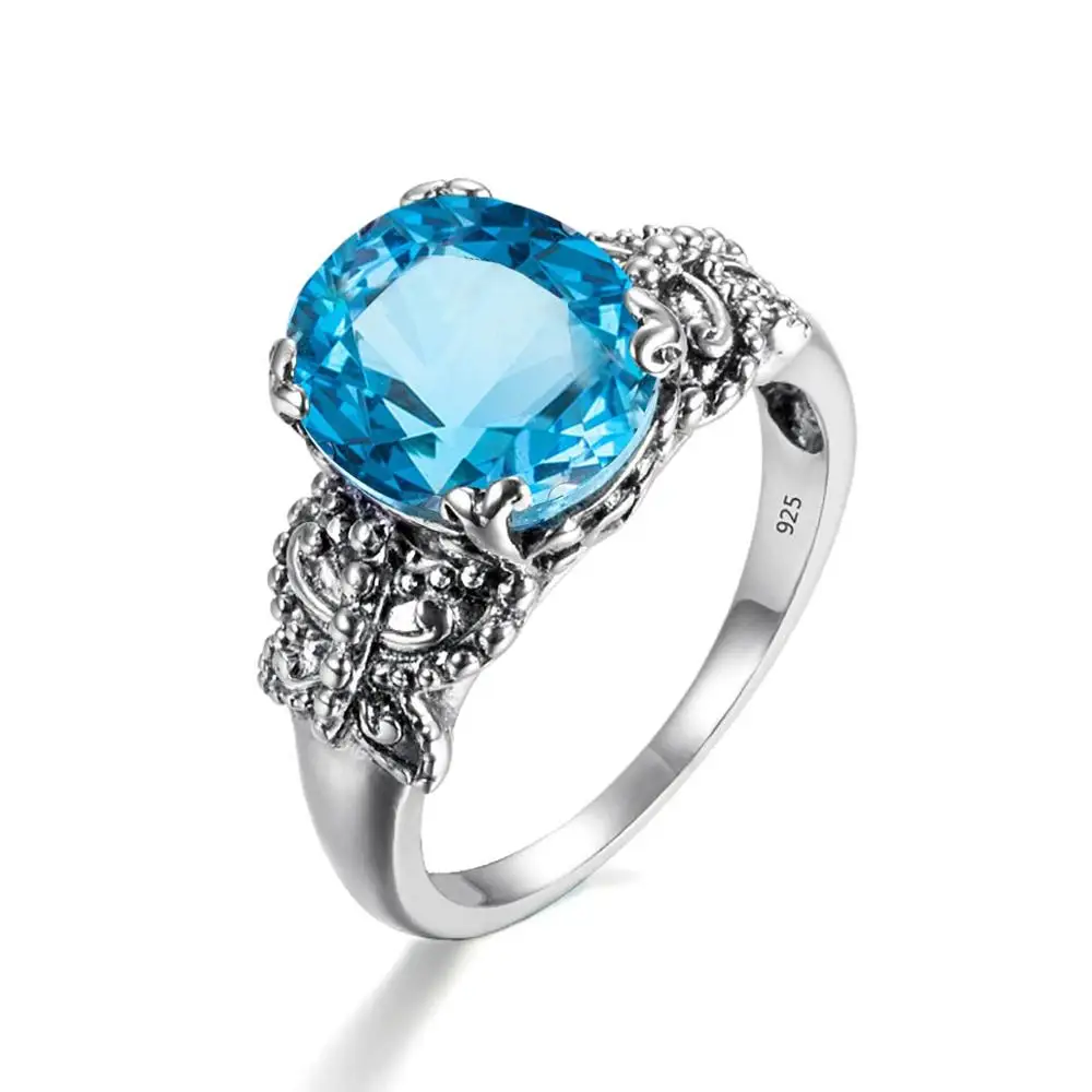 

Кольцо женское из серебра 925 пробы с голубым топазом и бабочкой