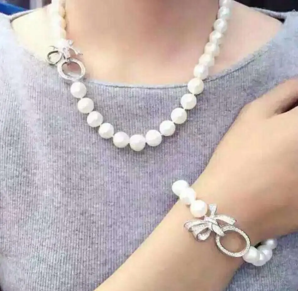 

Free Shipping noble jewelry 9-10mm Freshwater white pearl necklace braceler set 925 silver