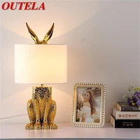 outela resin table lamp modern creative gold rabbit lampshade led desk light for home living room