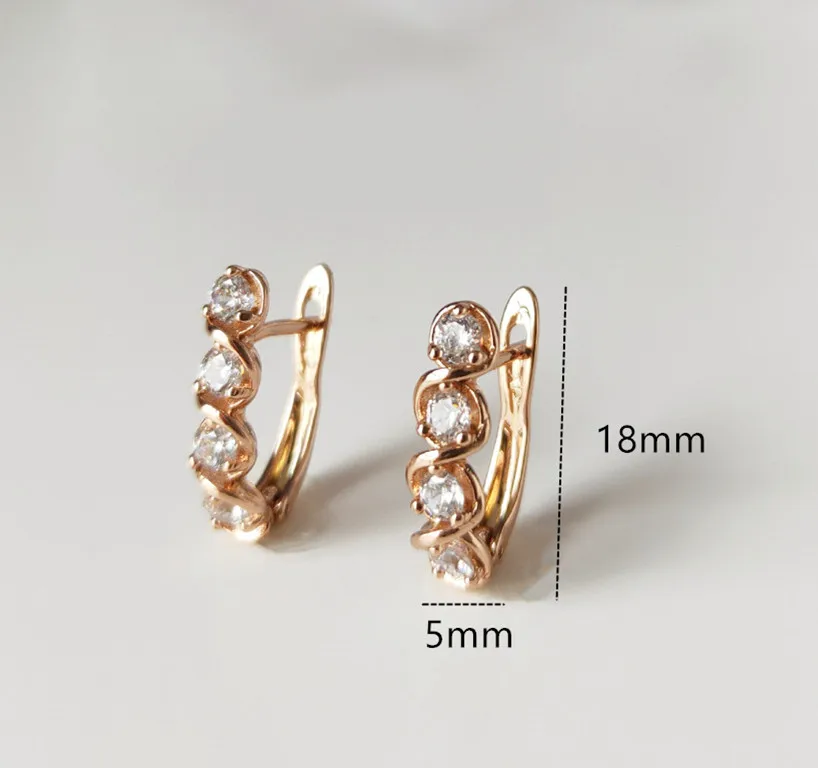 Серьги-гвоздики из розового золота 585 пробы с инкрустацией циркона праздничный