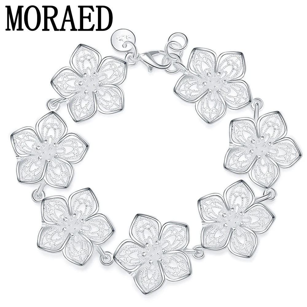 

Женский браслет из серебра 925 пробы с подвесками семь цветов