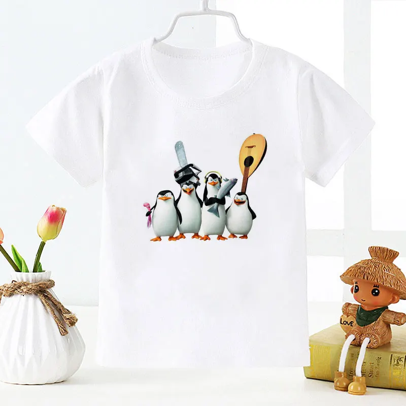 

Kawaii Madagascar Penguin Graphic Baby Boy Summer Clothes Harajuku Shirt Aesthetics Girl T Shirt Round Neck Girls Shirts Unisex