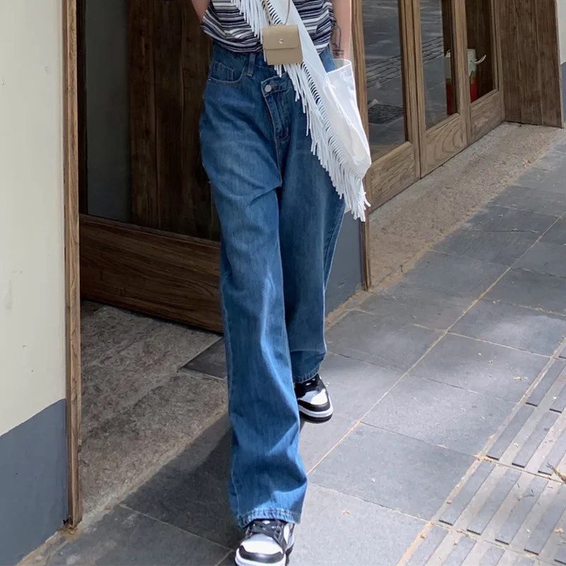 Джинсовые брюки небольшого размера потертые темно-синие джинсы женские