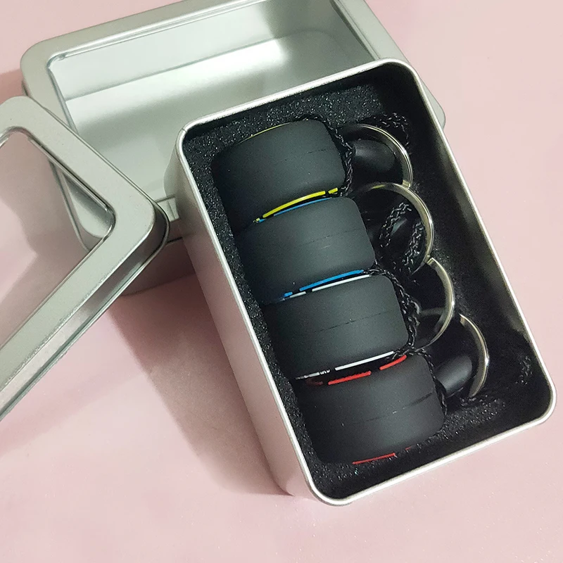 

Luxury F1 Racing Souvenirs Car Tire Keychain Gift Box Set Mini Simulation tire Car Keychains Jewelry Unisex Key-Ring Charm