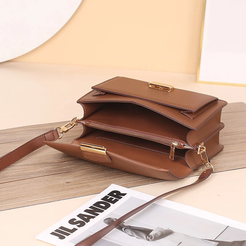 

Wide shoulder belt leather crossbite single shoulder armpit bag with lock lock, large capacity and small square bag