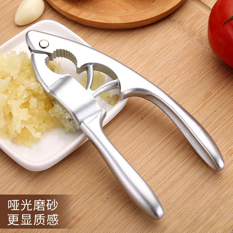 

Aluminum alloy garlic press Garlic masher walnut peeler Kitchen creative gadgets