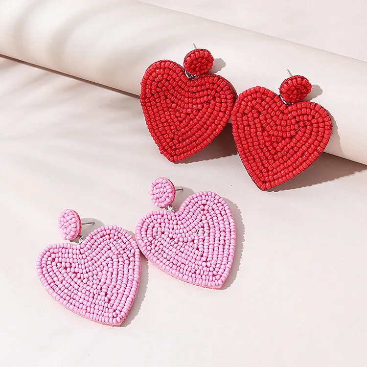 South Korea's East Gate ins wind rice beaded peach heart exaggerated high-level atmospheric round face thin handmade earrings