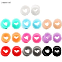guemcal 2pcs fashionable personality silicone heart shaped ear amplifying body piercing jewelry
