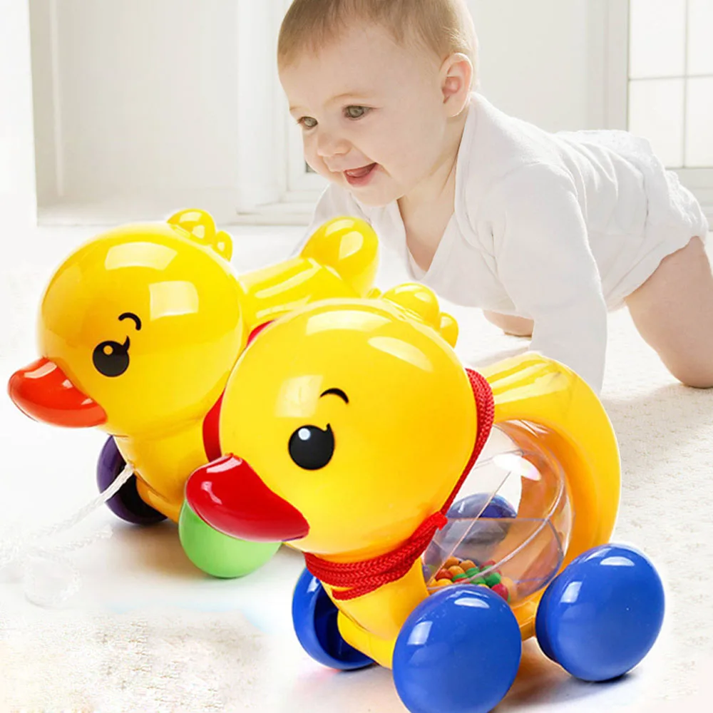 

Baby Rattles Pull Rope Yellow Duck Hand Jingle Shaking Bell Car Rattles Toys Music Handbell For Kids Birthday Gifts