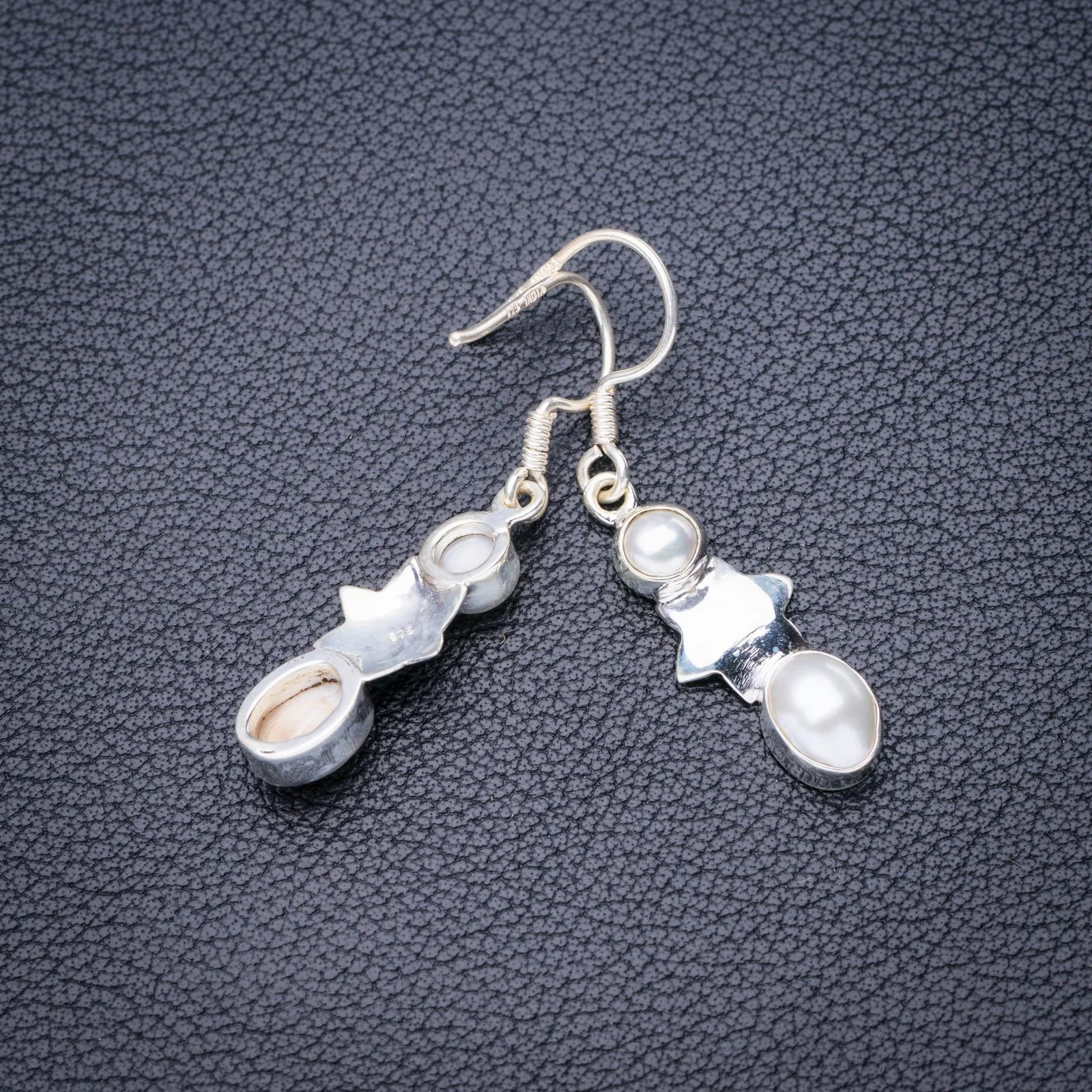 

Серьги из серебра 1,5 пробы с натуральным речным жемчугом