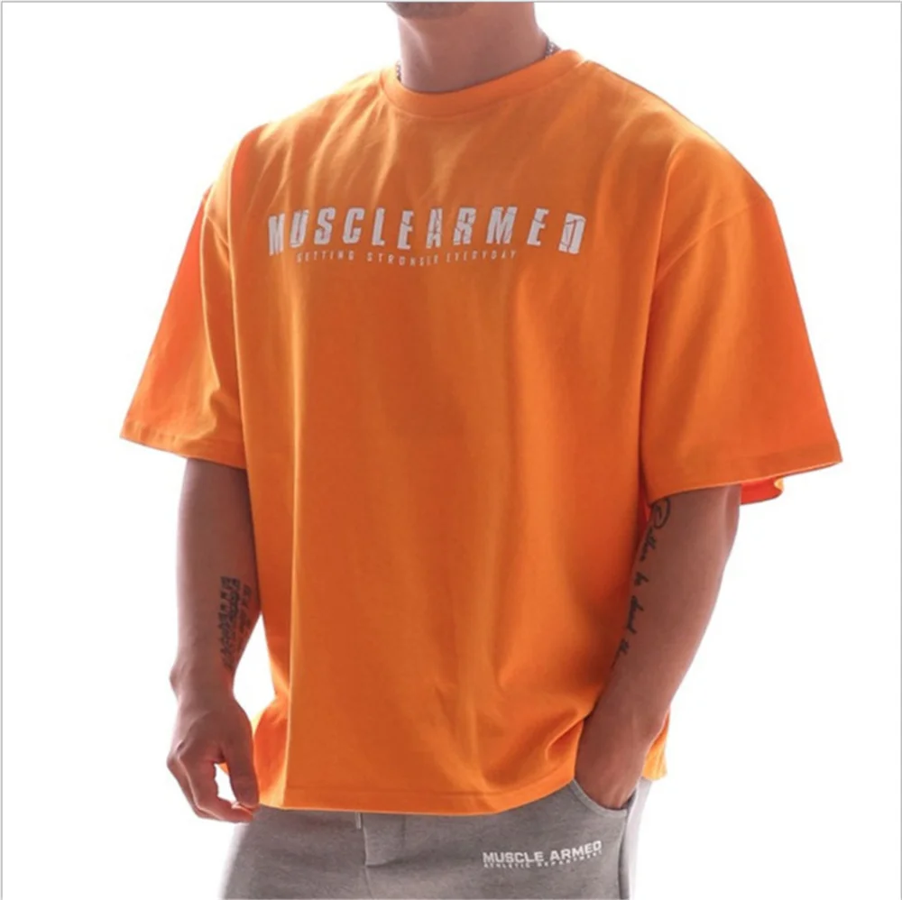 

2021 Spring And Summer New Men's Sports T-Shirt Short Sleeve Muscle Fitness Running Training Large Size Loose Short Sleeve