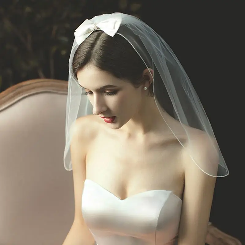 

Короткая Тюлевая свадебная фата T84B, корейский стиль, 1 уровень, изогнутая отделка, искусственный жемчуг, бусины, атласный бант, с расческой