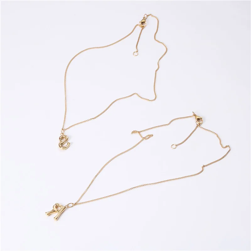 

Ladies fashion titanium steel gold-plated retro 26 letter necklace female sweater chain pendant simple niche net red clavicle ch