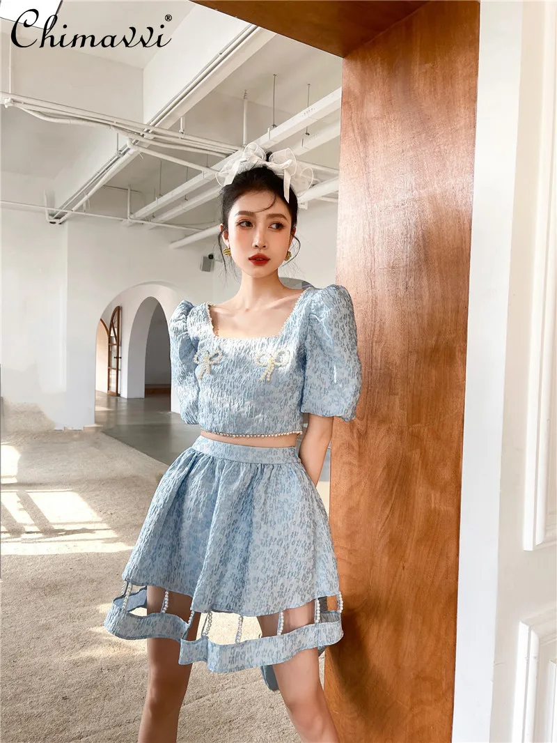 

Sweet Refreshing Stylish 2-piece Set 2021 New Women's Bubble Sleeve Bow Pearl Short Top+High Waist Slimming Hollow Skirt
