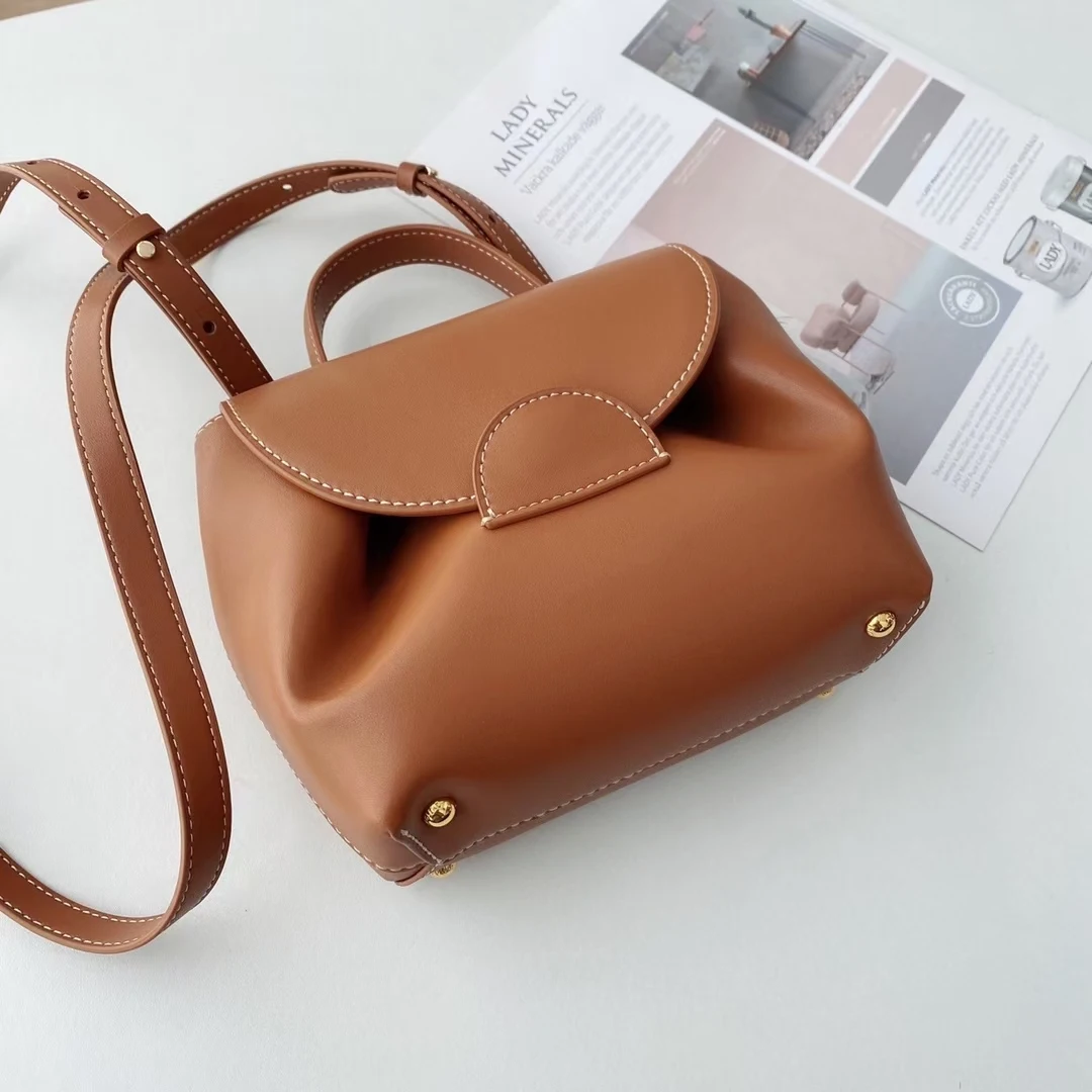 

French niche round spot engraved Genuine leather bag women's shoulder messenger handbag trend