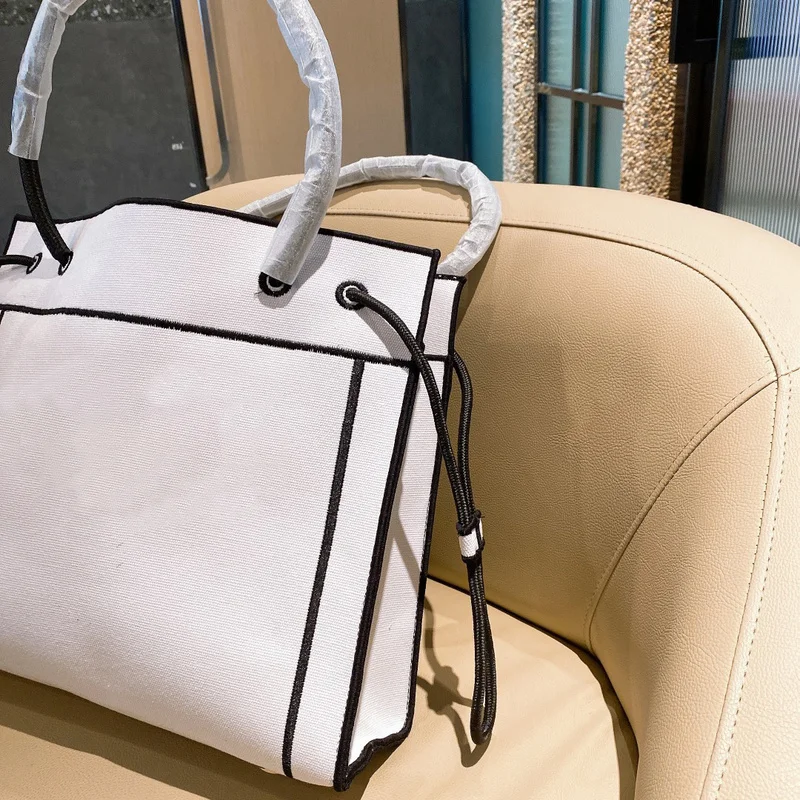 

2021 latest spring fashion casual simple canvas one-shoulder messenger handbags large capacity ladies handbags