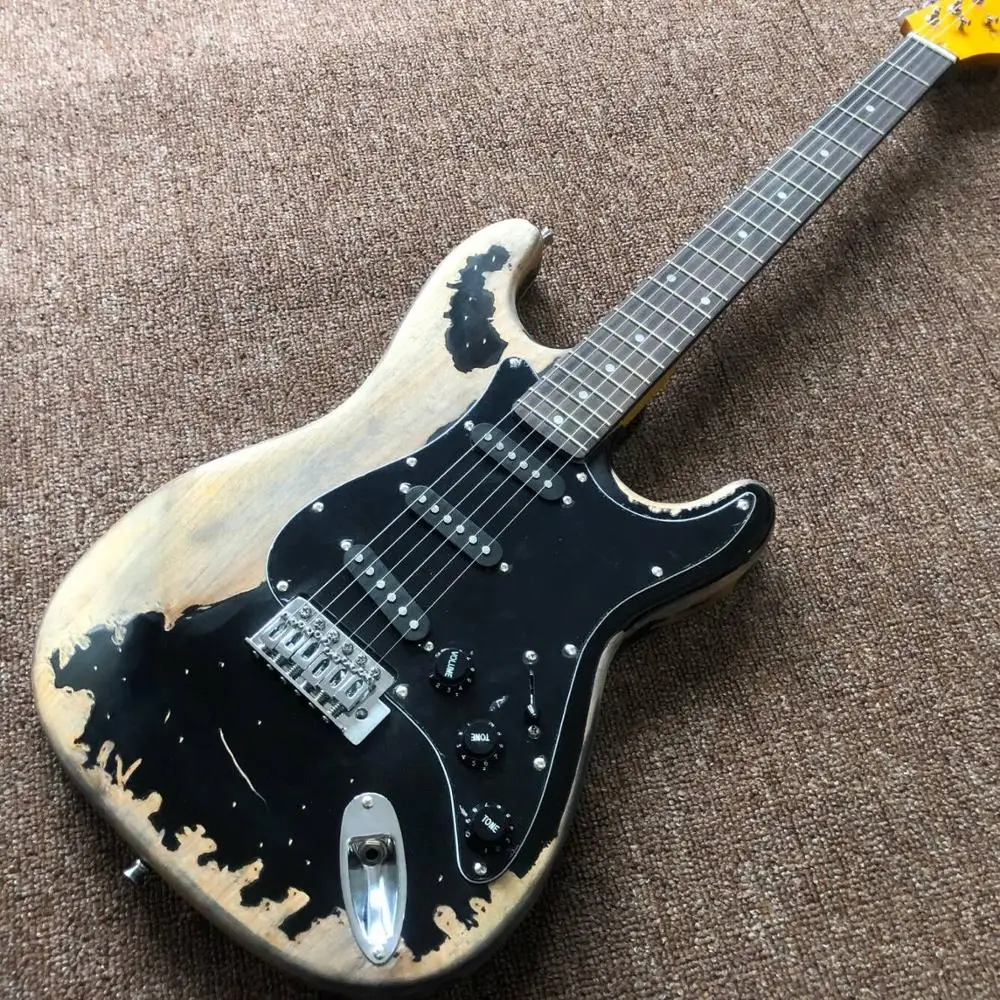 

Электрическая гитара черного цвета gitaar, реликсы руками. 6 штук ручной работы, гриф из палисандра, реальные фотографии