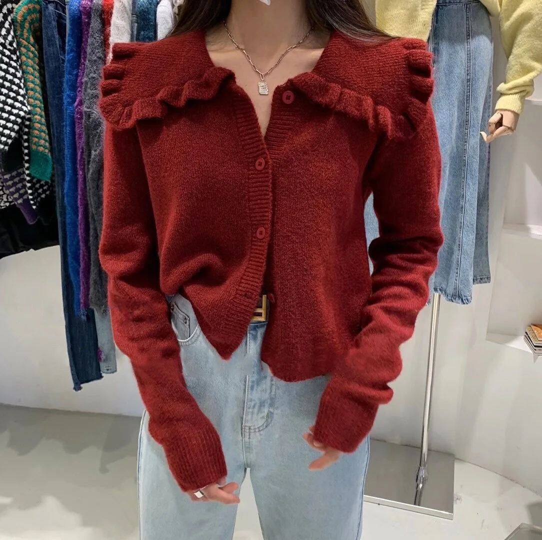 

2021 autumn and winter new sweet and age-reducing long-sleeved knitted cardigan female doll collar sweaterwith wooden ears