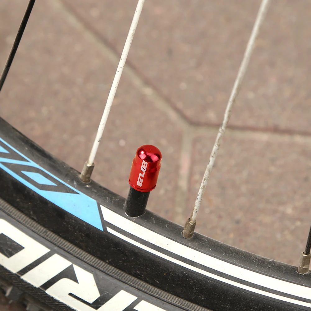 

Small Bicycle Tire Valve Cap Mountain Bike Schrader Tire Valve Protector Cover Biking PortableDustproof Cycling Parts