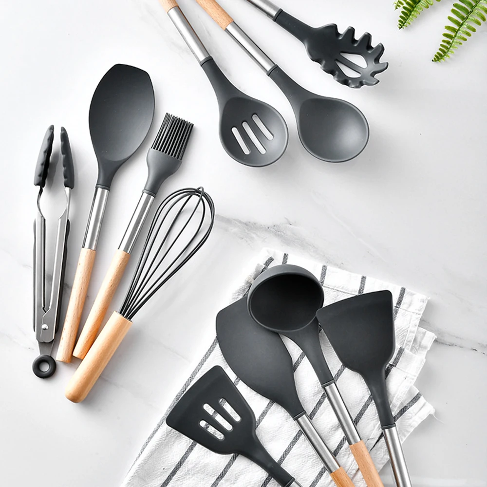 

Silicone Cooking Utensils Set Non-stick Cookware The wooden handle Easy to clean Egg Beaters Shovel Spoon Soup Kitchen Utensils