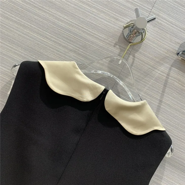 

Eureeky Luxury Black Mini Dress Women 2021 Early Spring High-end Brand Sweet Petals Bow Button Sleeveless A-line Short Dresses