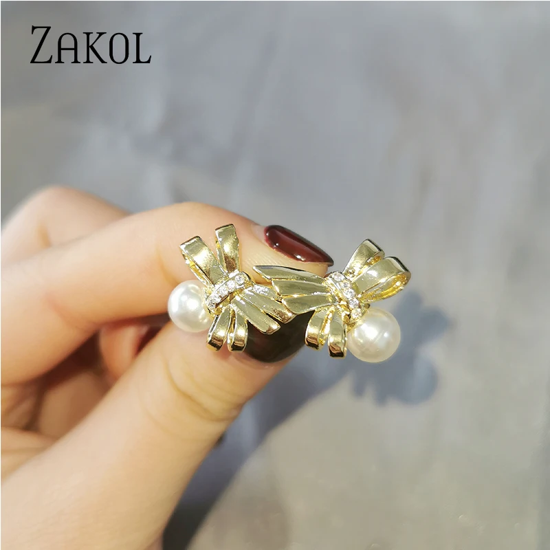 

ZAKOL Fashion Bow Wings Design White Gold Color Pearl Earrings Women Daily Party Temperament Stud Earrings Accessories FSEP2639