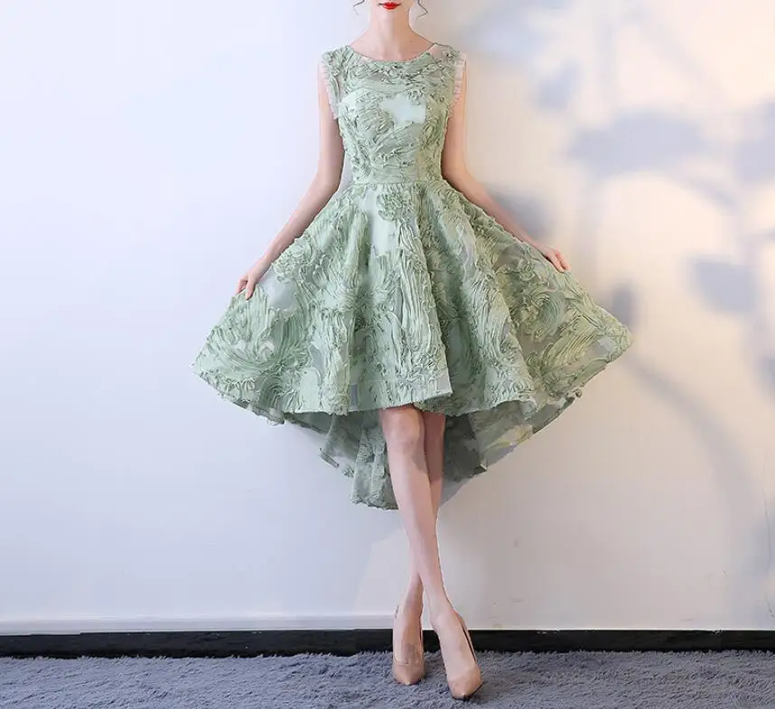 Светло-зеленое короткое спереди длинное сзади вечернее платье Элегантное