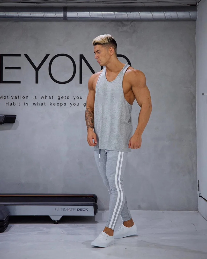 2020 men's tight trousers sports and leisure sweat-absorbent hit color zipper pants autumn new | Мужская одежда