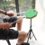 green drum and stand