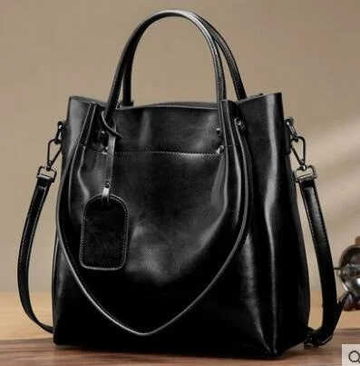 

2021 new women's bag leather one shoulder messenger bag women's hand-held large bag oil wax cow leather Korean leather women's