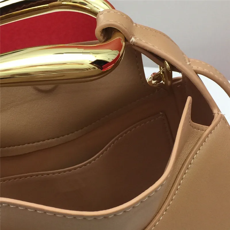 

Fashionable metal leather hand-held small round bag, one shoulder versatile, underarm women's bag, under net red messenger bag