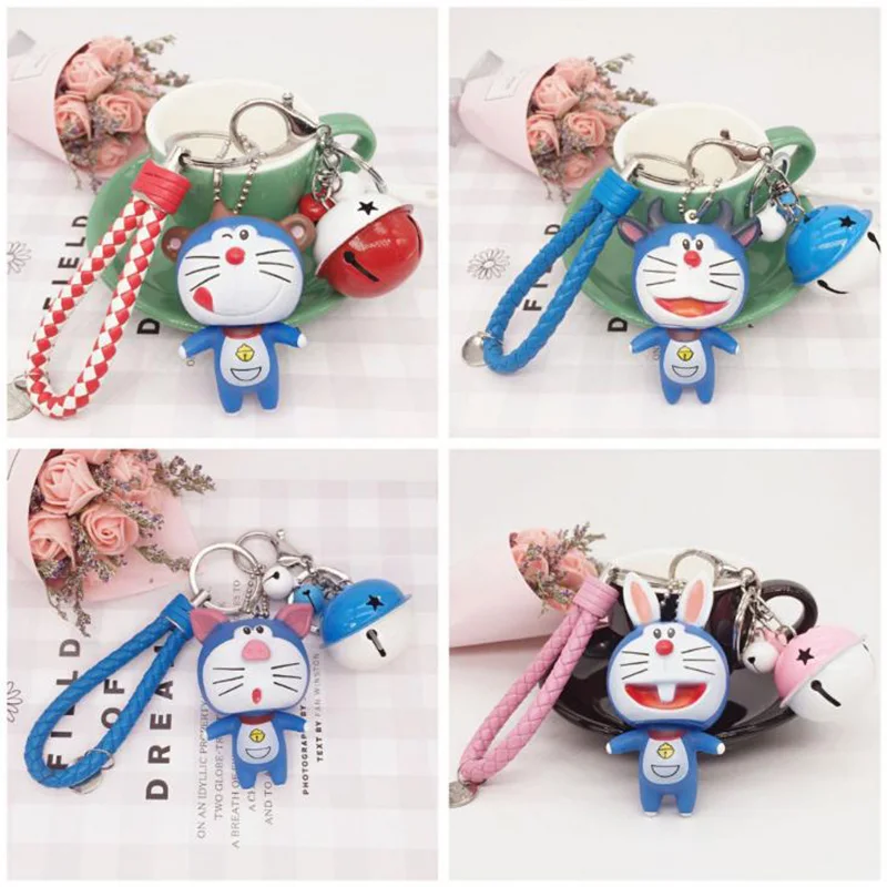 

Cute Cartoon Zodiac signs Doraemon Girl Toys Fur Bells Keychain Women Leather Strap Metal Key Ring Chains Car Bag