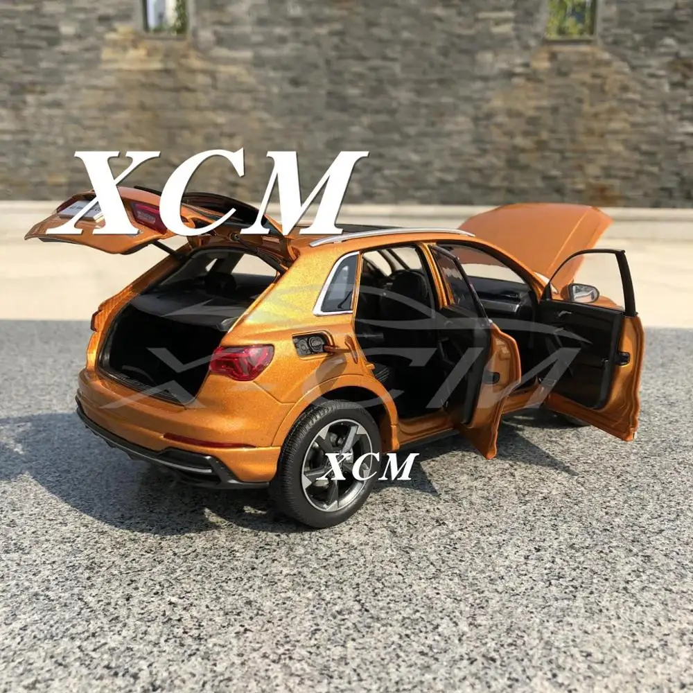 Модель литая автомобиля для всех новых моделей Q3 2019 1:18 (оранжевый) + небольшой