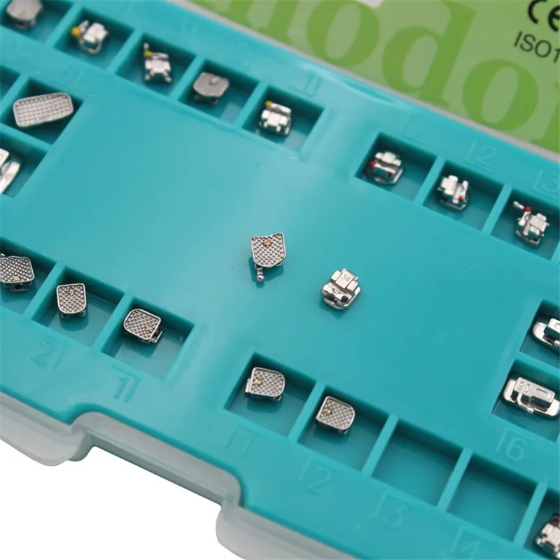 

Стоматологическая Скоба Ортодонтическая Скоба пассивные самолигирующие скобы Roth 0,022 Крючки 3 4 5 с букальными трубками